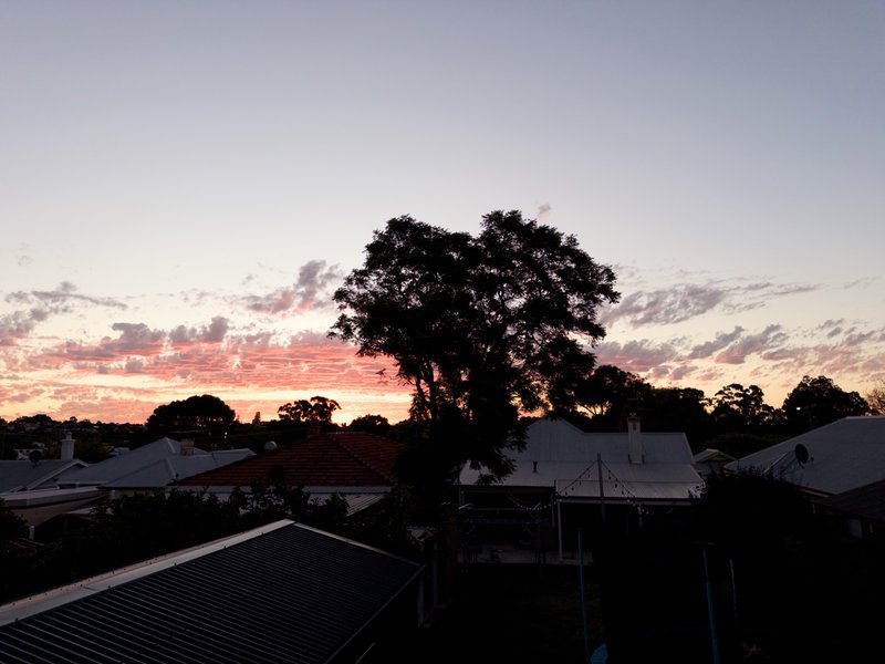 Sunset over houses